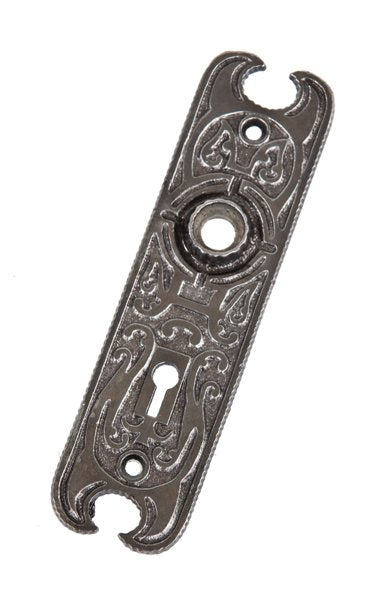 unusually shaped early 20th century american refinished ornamental cast iron interior residential doorknob backplate with fluted thimble