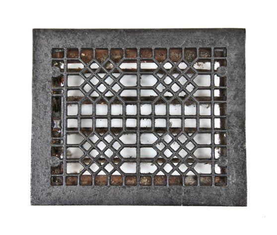 late 19th or early 20th century uniform black enameled ornamental cast iron "indian lattice" pattern louvered residential floor grate