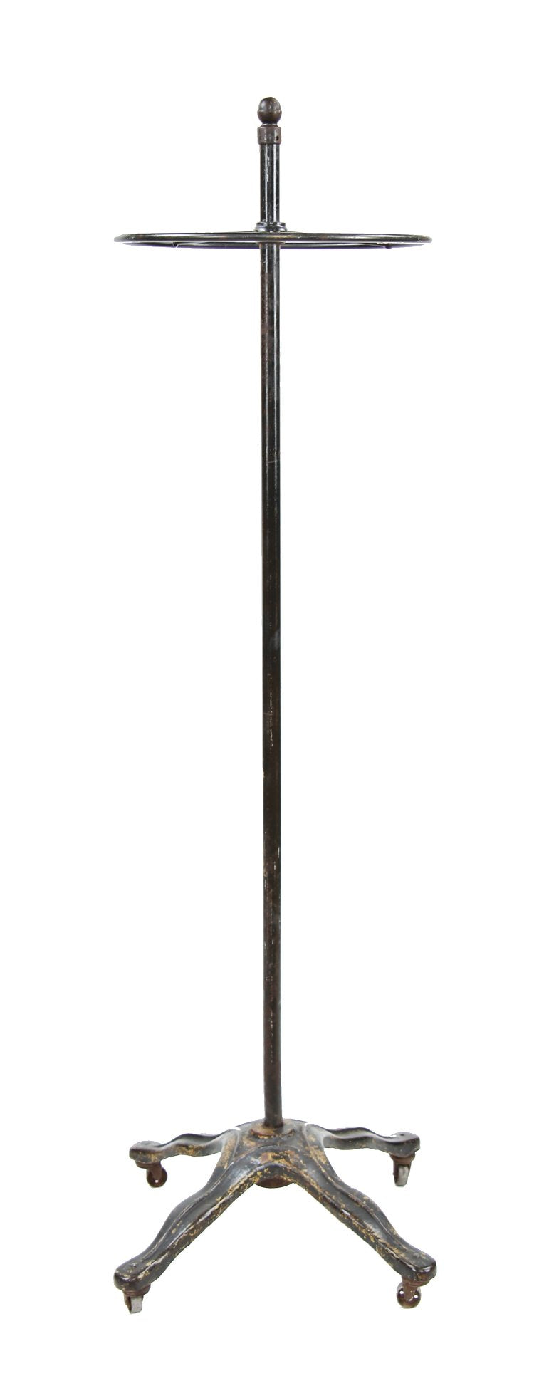 turn of the century american vintage industrial black enameled metal freestanding garment rack with ornamental cast iron base with casters
