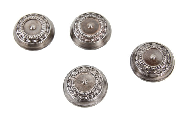 four matching c. 1900's interior residential ornamental refinished stamped or pressed steel "como" pattern passage size doorknobs