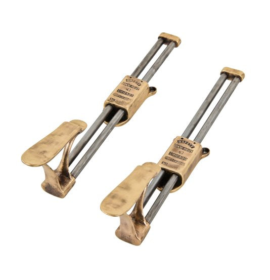 matching set of c. 1920's american vintage industrial bronze and steel shoe shining stand "safety" slidable shoe rests or supports