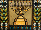exceptionally well-made and richly colored american leaded stained glass emblematic synagogue window featuring a menorah mounted on tiered pedestal