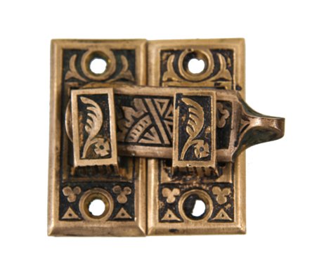 single 19th century american eastlake style ornamental cast bronze "oriental" pattern shutter door latch with matching catch