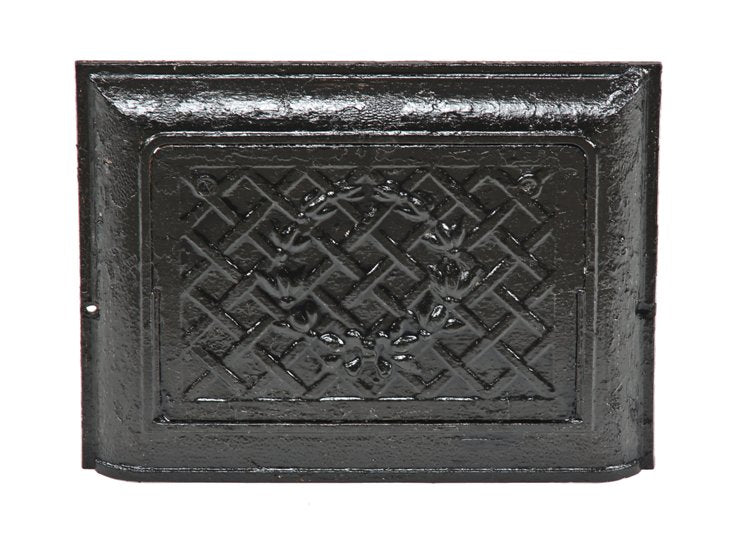 distinctive antique american black enameled interior residential ornamental cast iron baseboard register with centrally located laurel wreath