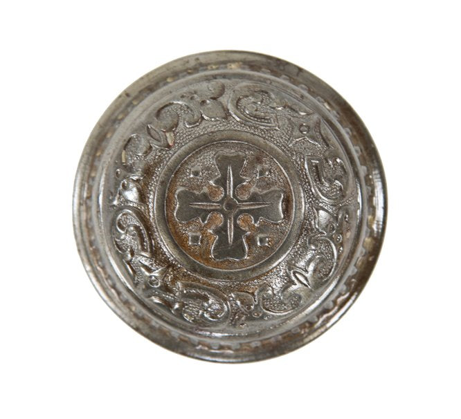 original c. 1900's american antique dome-shaped ornamental stamped steel banded rim passage size doorknob with brushed metal finish