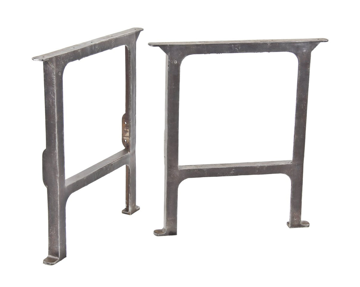 two matching c. 1900's structurally sound and robust refinished cast iron factory workbench bases or legs salvaged from a chicago paint factory
