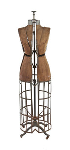 fully adjustable early 20th century amrican made vintage industrial department store window display dress form with functional casters