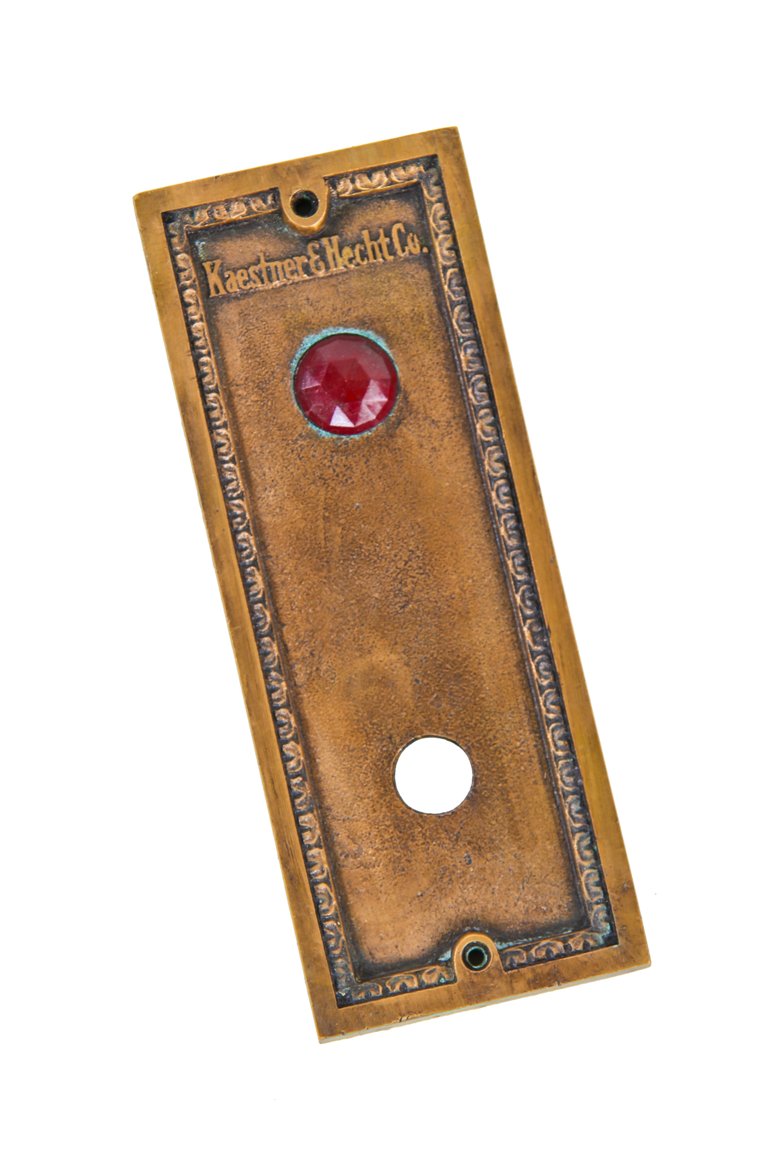 original early 20th century wall-mount ornamental cast bronze metal commercial building elevator cab call button backplate with ruby red glass indicator light