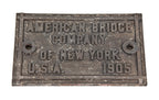 original early 20th century american vintage industrial flush mount chicago & northwestern railroad bridge plaque comprised of cast iron with brushed metal finish