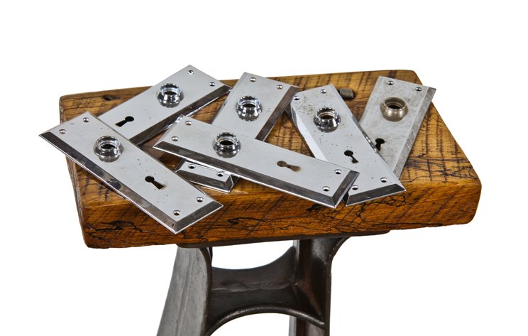 six matching c. 1920's stamped steel residential lavatory doorknob backplates or escutcheons with chrome plated finish