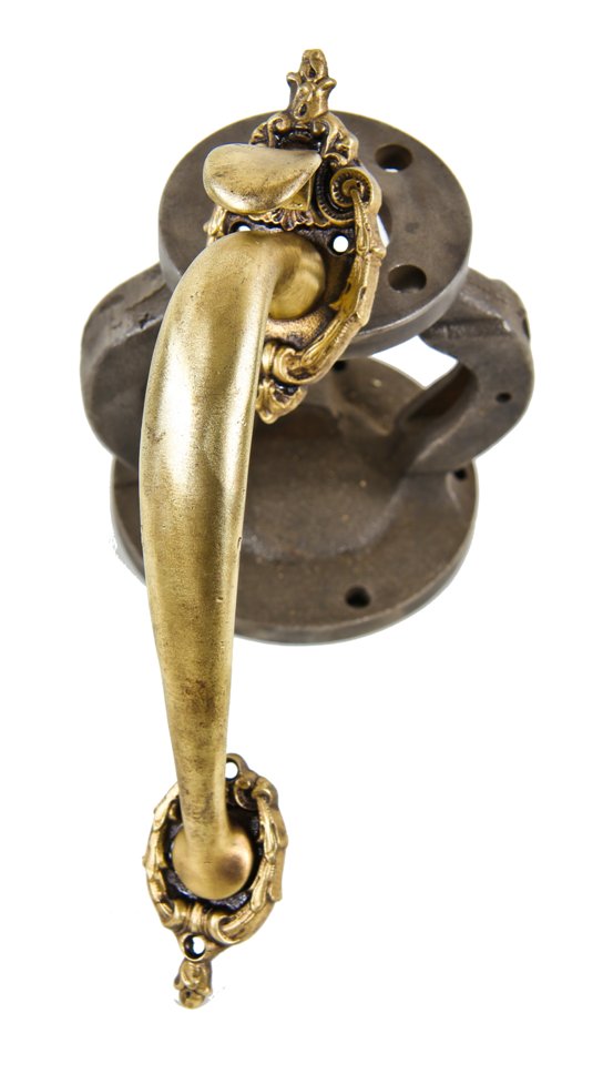 antique american exterior chicago commercial building ornamental cast brass thumblatch door handle with detailed bellflower design motifs