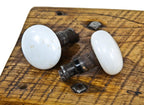 two matching original c. 1880's antique american interior residential white porcelain "screwless spindle" passage door handles