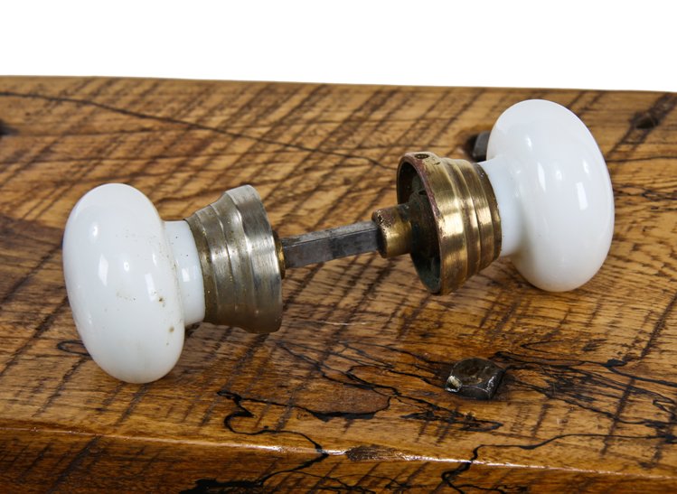 two distinctive original and intact 19th century mushroom-shaped white opalescent glass residential passage door handles with tapered shanks