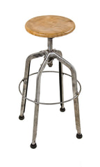 very unique fully adjustable c. 1930's "uhl art steel" four-legged stationary stool with functional clutch and oversized welded joint heel ring