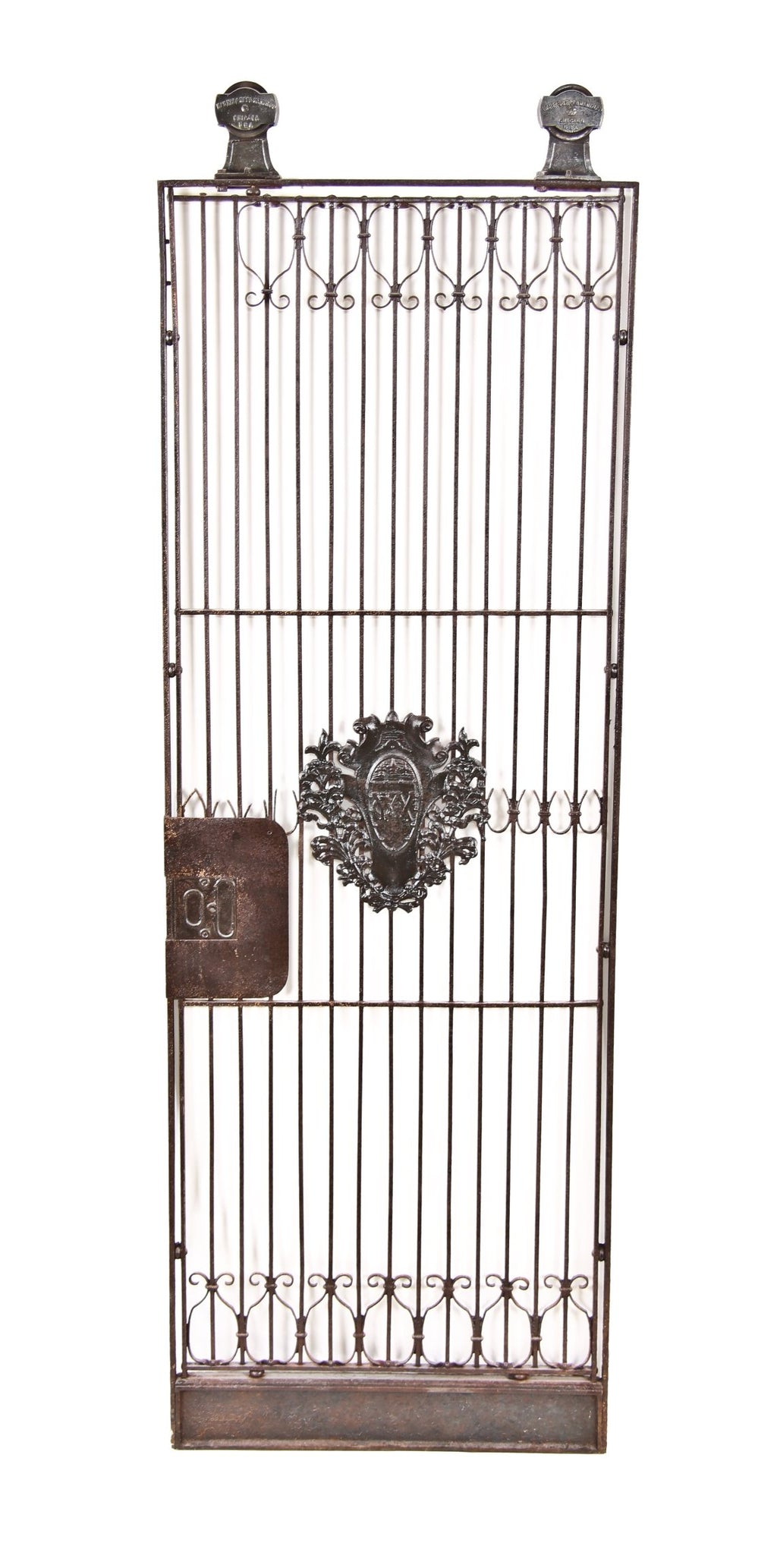 late 19th century original refinished wrought and cast iron ornamental interior y.w.c.a. hotel building elevator door with emblematic cartouche
