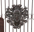 late 19th century original refinished wrought and cast iron ornamental interior y.w.c.a. hotel building elevator door with emblematic cartouche