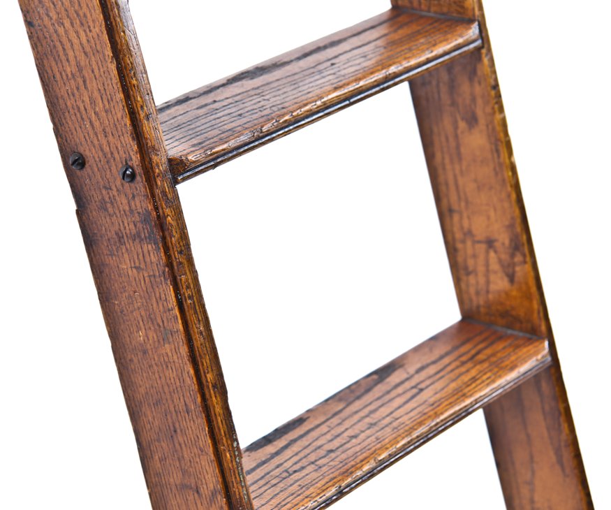 exceptional american depression era varnished oak wood "cotterman" hardware store rolling ladder with intact upper roller fixtures