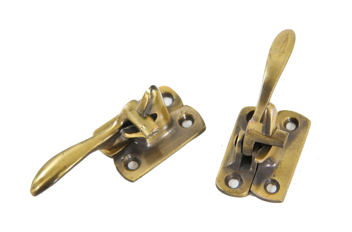matching set of original c. 1920's american antique fully functional cast brass drugstore cabinet door latches with matching keepers