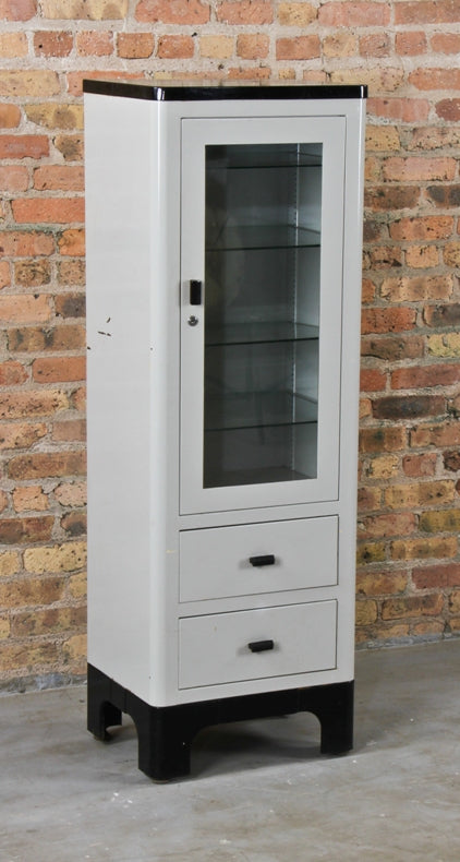 all original and completely intact late 1930's american vintage medical "steeline" hospital examination room supply cabinet with adjustable plate glass shelves