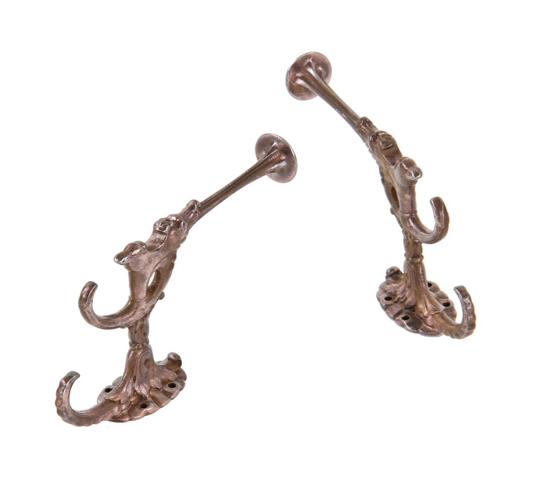 pair of original antique american victorian era copper-plated cast iron figural open-mouthed grotesque residential parlor hall tree hooks