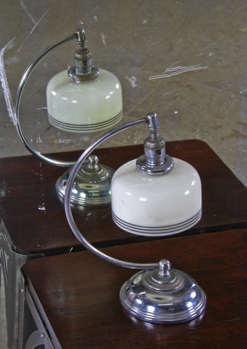 all original american art deco style machine age bent chrome-plated tubular brass desk or table lamp with custard shade containing "speed" rings