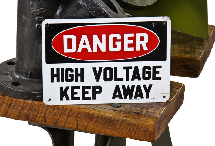 late 1940's "new old stock" vintage american industrial die cut steel high voltage single-sided factory cautionary or warning sign