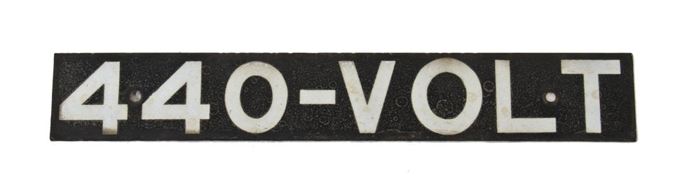 late 1940's single-sided american vintage industrial die cut steel "440-volt" black porcelain enameled cautionary or warning sign