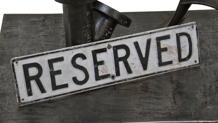 c. 1950's vintage american single-sided heavy gauge die cut steel "reserved" funeral parking lot sign with embossed lettering