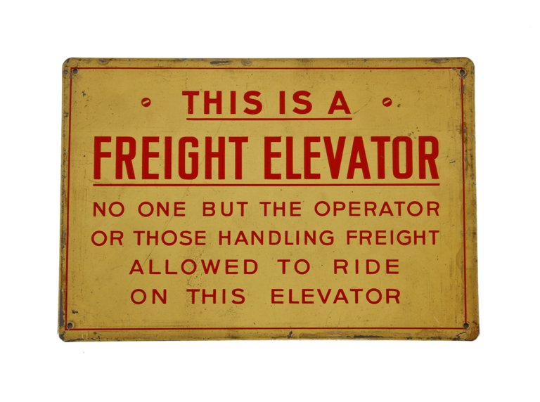 nicely aged single-sided c. 1940's vintage american industrial die cut baked enameled "this is a freight elevator" factory notification sign