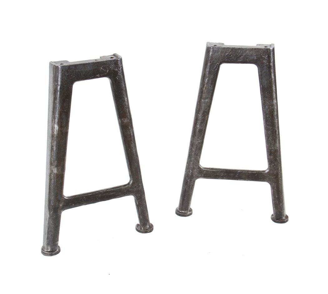two matching early 20th century vintage american industrial refinished cast iron factory machine bases or legs with circular floor plates