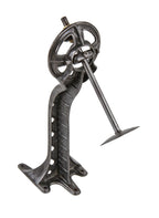 very unusual original c. 1900's american antique heavy cast iron wall-mount punching-bag apparatus with ornamental bracket and rebounding device