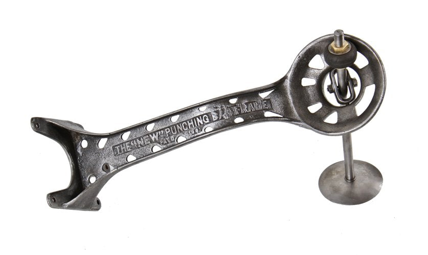 very unusual original c. 1900's american antique heavy cast iron wall-mount punching-bag apparatus with ornamental bracket and rebounding device