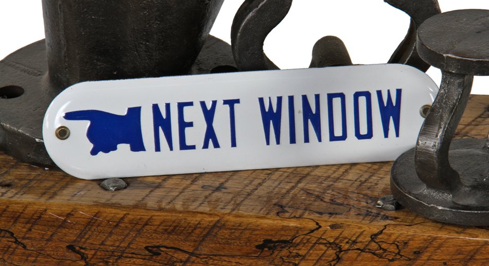 original c. 1920's "new old stock" single-sided porcelain enameled die cut steel "next window" clerical office sign with pointing finger