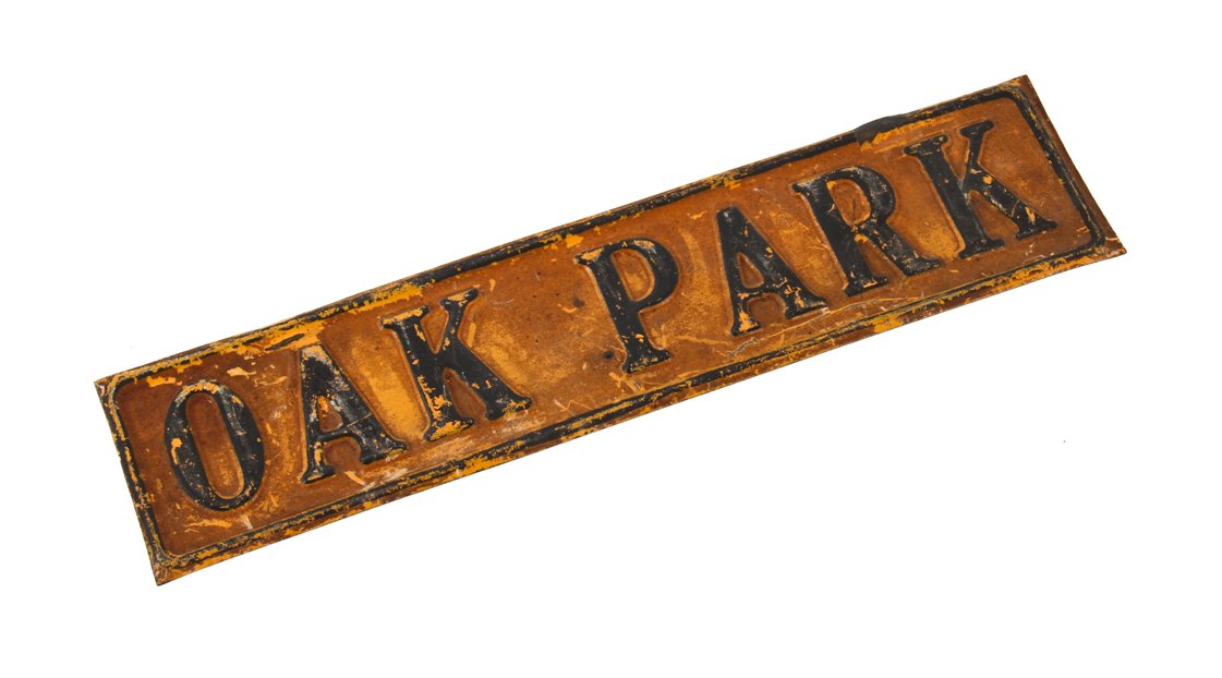 unusual depression era vintage american stamped steel "oak park" automobile license plate topper with black enameled embossed letters