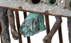 very unique freestanding weathered and worn c. 1960's american industrial doll mold rack with a complete set of stationary appendages