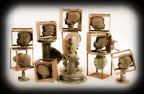 very unique freestanding weathered and worn c. 1960's american industrial doll mold rack with a complete set of stationary appendages