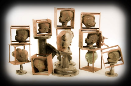 original vintage american industrial oversized hollowed copper toy factory infant doll head "production" mold affixed to bracket containing allover rust