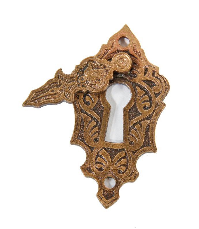 single 19th century ornamental cast bronze interior residential passage door key escutcheon with swinging keyhole cover