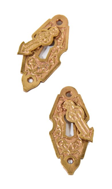 19th century american ornamental cast bronze interior residential passage door keyplate escutcheons with intact swinging keyhole covers