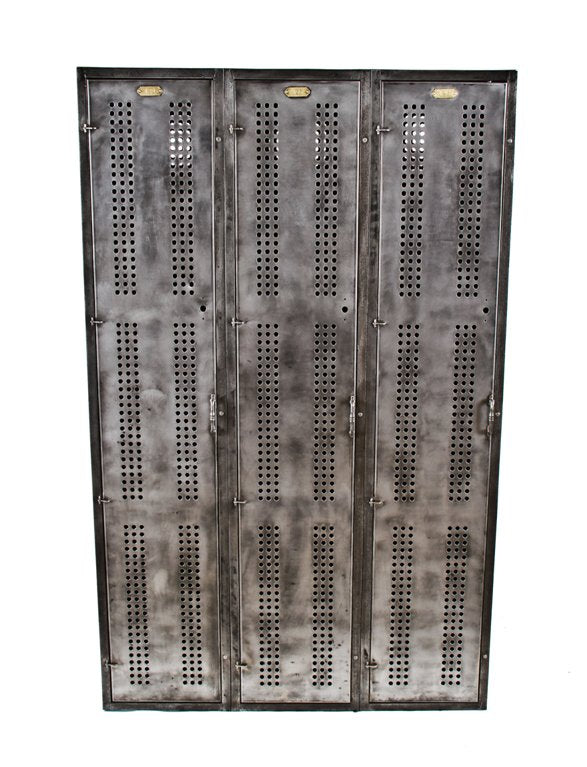 amply ventilated c. 1911 original and hard to find heavy gauge steel three-unit freestanding factory locker with fully functional cast iron handles