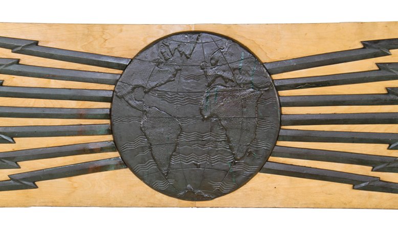 very rare c. 1920's american art deco cast bronze western telegraph company building exterior facade ornament featuring a globe flanked by lightning bolts