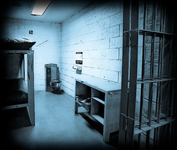 original 1950's vintage american industrial heavily reinforced solid steel cook county prison desk with swing-out seat