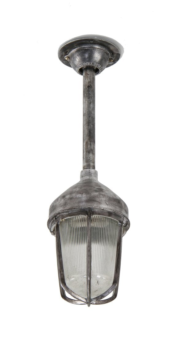 vintage american industrial single electric "explosion proof" factory pendant light fixture with fluted globe and aluminum cage
