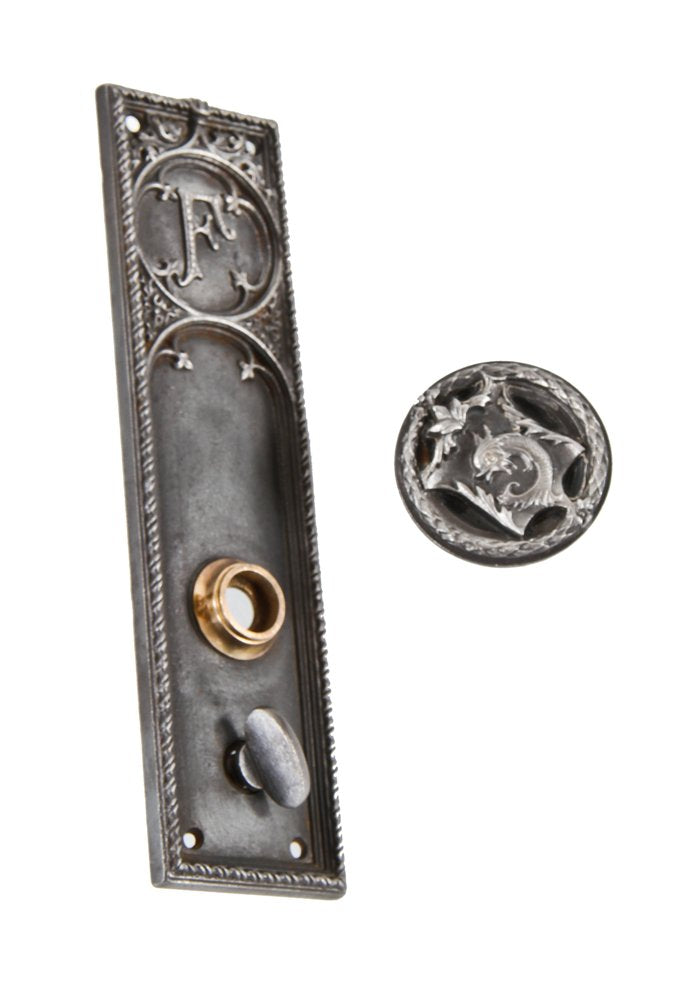 matching original 19th century interior fisher building office door ornamental cast iron monogrammed escutcheon and figural doorknob