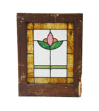 original and intact american antique arts & crafts style diminutive art glass residential casement window with abstract floral motif