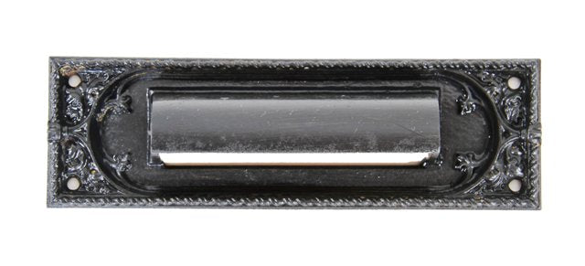 highly ornamented 19th century american gothic style black enameled cast iron fisher building interior office door mail slot chute