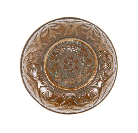 finely cast c. 1870's antique american ornamental cast bronze banded rim doorknob containing a sunken center with grapes and leafage