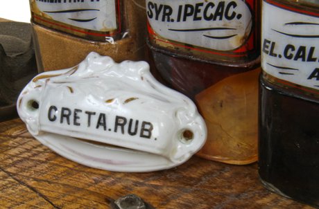 single original 19th century antique medical white porcelain apothecary cabinet sliding drawer handle with hand-applied gold leaf accent