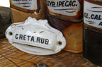 single original 19th century antique medical white porcelain apothecary cabinet sliding drawer handle with hand-applied gold leaf accent