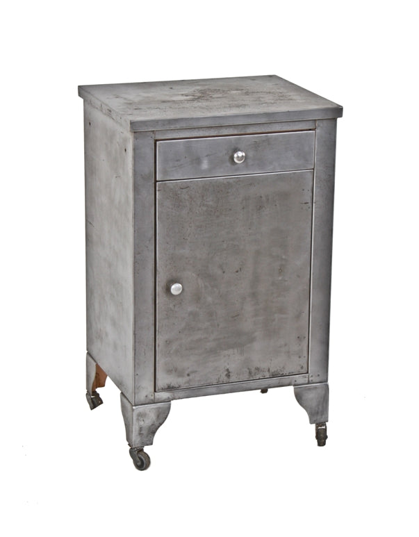 refinished antique american medical versatile hospital operating room folded and pressed steel supply cabinet with original "bassick" casters